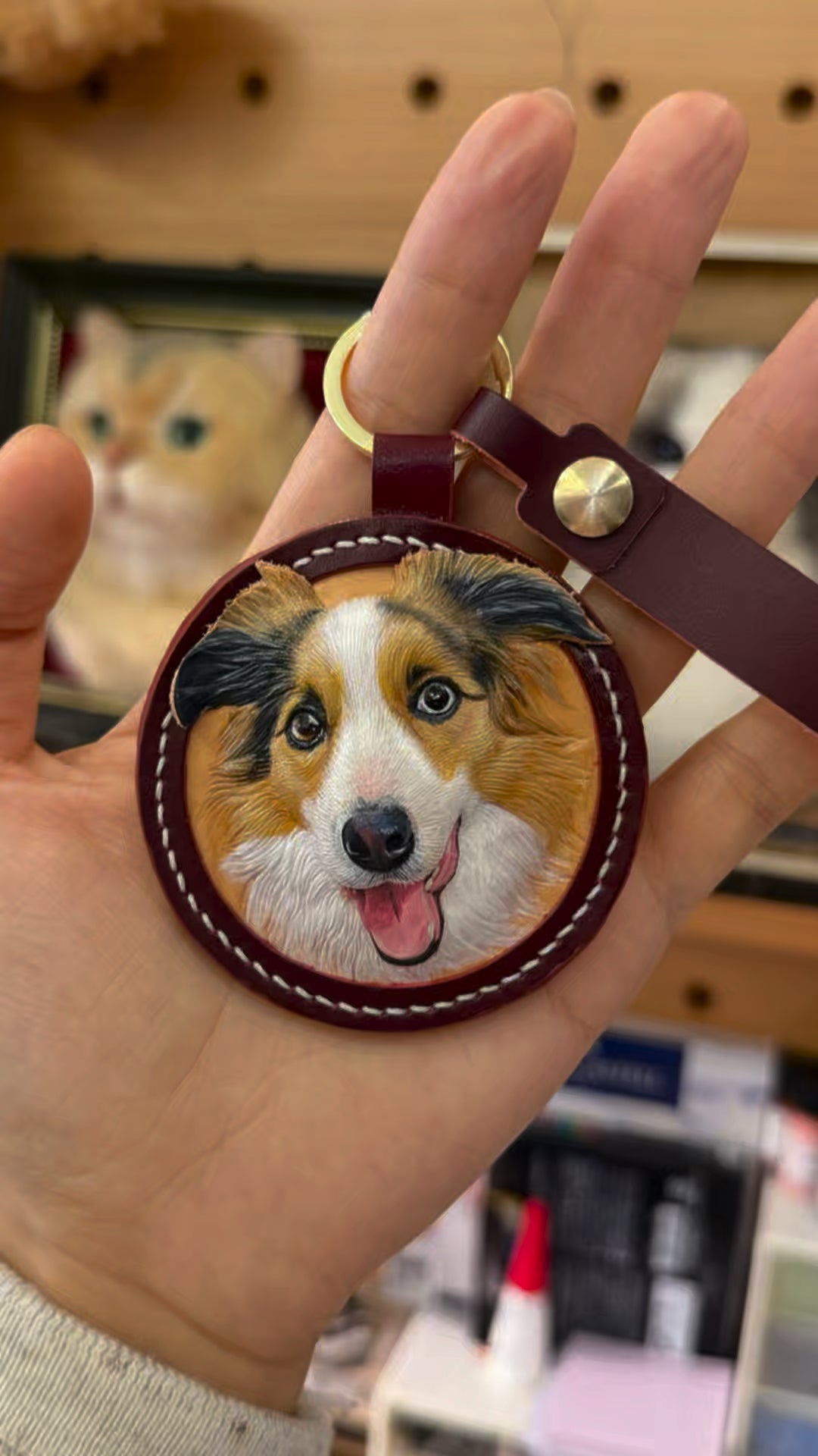 Hand-carved leather pet charm showing a pet portrait in vegetable-tanned leather