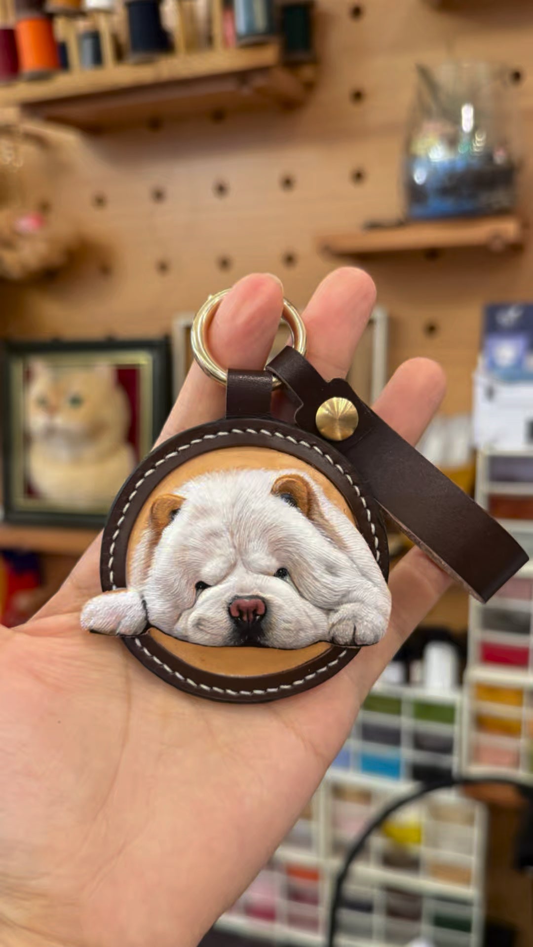 Leather carving in progress - cutting a pet portrait by hand